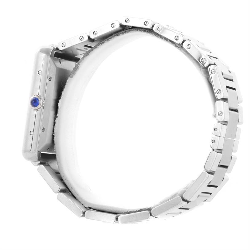 The image shows a side view of the Cartier Tank Solo W5200028 Men
s Stainless Steel Silver Dial W5200028 Men
s Stainless Steel Silver Dial watch with a focus on the crown and metal bracelet.