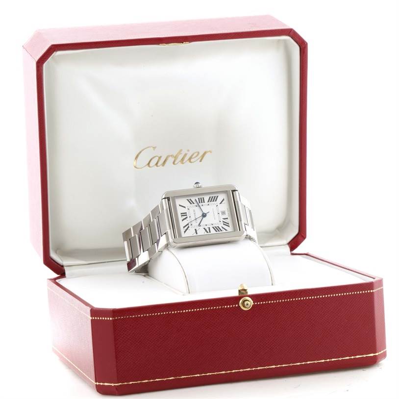 The image shows a Cartier Tank Solo W5200028 Men
s Stainless Steel Silver Dial W5200028 Men
s Stainless Steel Silver Dial watch with a rectangular case and metal bracelet, placed in a red Cartier display box.