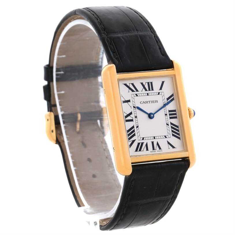 The Cartier Tank Solo W1018855 Men
s Steel and Gold (two tone) Silver Dial W1018855 Men
s Steel and Gold (two tone) Silver Dial watch is shown at an angle displaying its face, Roman numeral dial, and black leather strap.