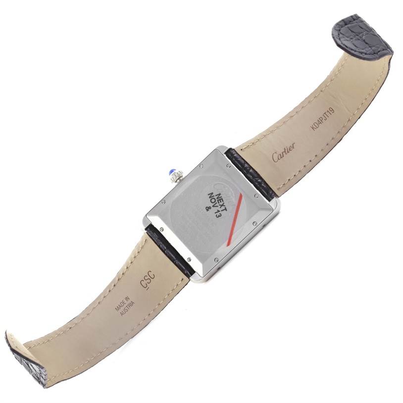 The image shows the back view of a Cartier Tank Solo W5200027 Men
s Stainless Steel Silver Dial W5200027 Men
s Stainless Steel Silver Dial watch, displaying its case back and leather straps.