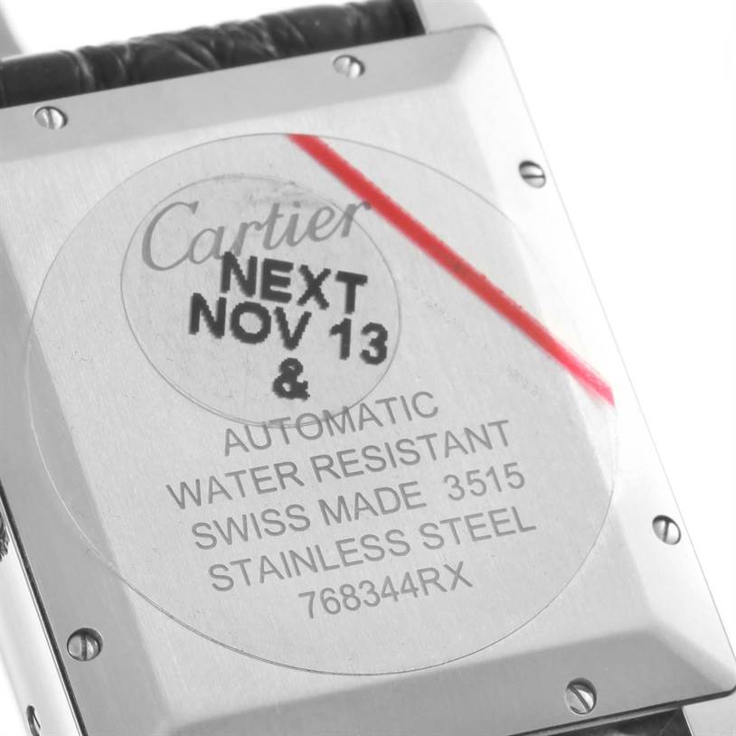 This image displays the case back of the Cartier Tank Solo W5200027 Men
s Stainless Steel Silver Dial W5200027 Men
s Stainless Steel Silver Dial watch, showing its engravings and strap attachment.