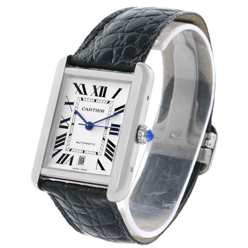 The image shows a Cartier Tank Solo W5200027 Men
s Stainless Steel Silver Dial W5200027 Men
s Stainless Steel Silver Dial watch at an angle highlighting its rectangular face, black leather strap, and crown with a blue gem.