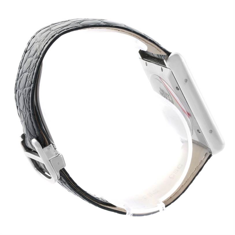 The image shows a side view shot of a Cartier Tank Solo W5200027 Men
s Stainless Steel Silver Dial W5200027 Men
s Stainless Steel Silver Dial watch, focusing on the side of the case and the leather strap with buckle.