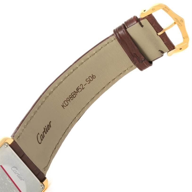 The image shows the backside of the strap and buckle of the Cartier Tank Solo W1018855 Men
s Steel and Gold (two tone) Silver Dial W1018855 Men
s Steel and Gold (two tone) Silver Dial watch.