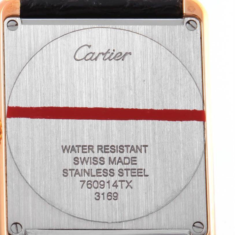 This image shows the back case of a Cartier Tank Solo W5200025 Steel and Gold (two tone) Silver Dial W5200025 Steel and Gold (two tone) Silver Dial watch, highlighting its water resistance, origin, and model details.