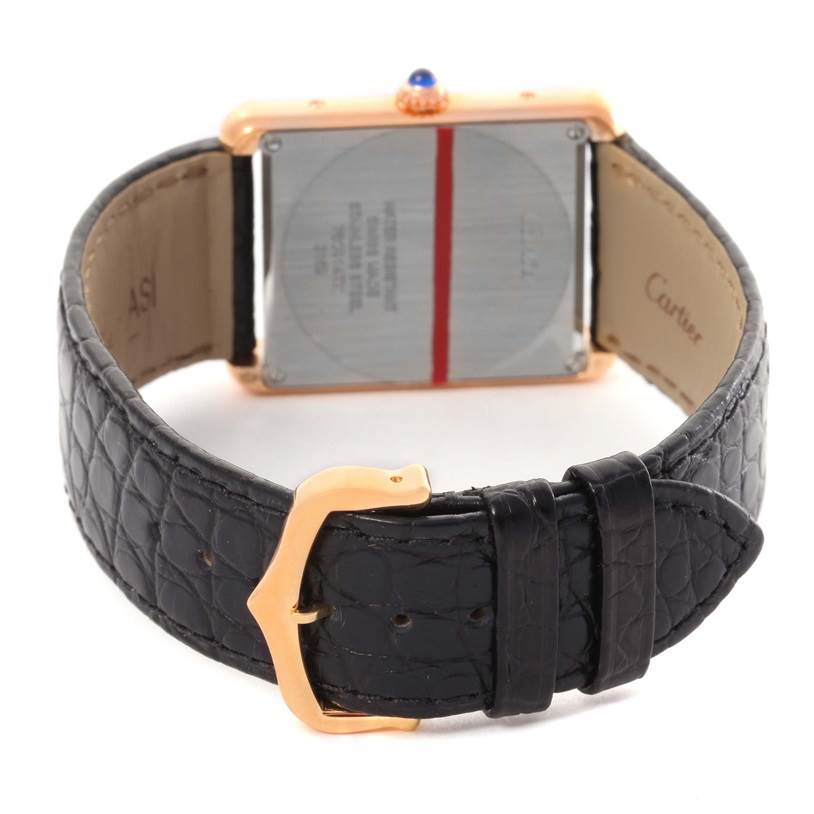 The image shows the back view of a Cartier Tank Solo W5200025 Steel and Gold (two tone) Silver Dial W5200025 Steel and Gold (two tone) Silver Dial watch, highlighting its strap, buckle, and case back.