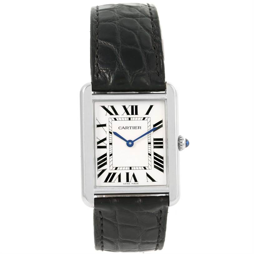 The image shows a front view of the Cartier Tank Solo W1018355 Stainless Steel Silver Dial W1018355 Stainless Steel Silver Dial watch, including its face, Roman numerals, blue hands, and black leather strap.