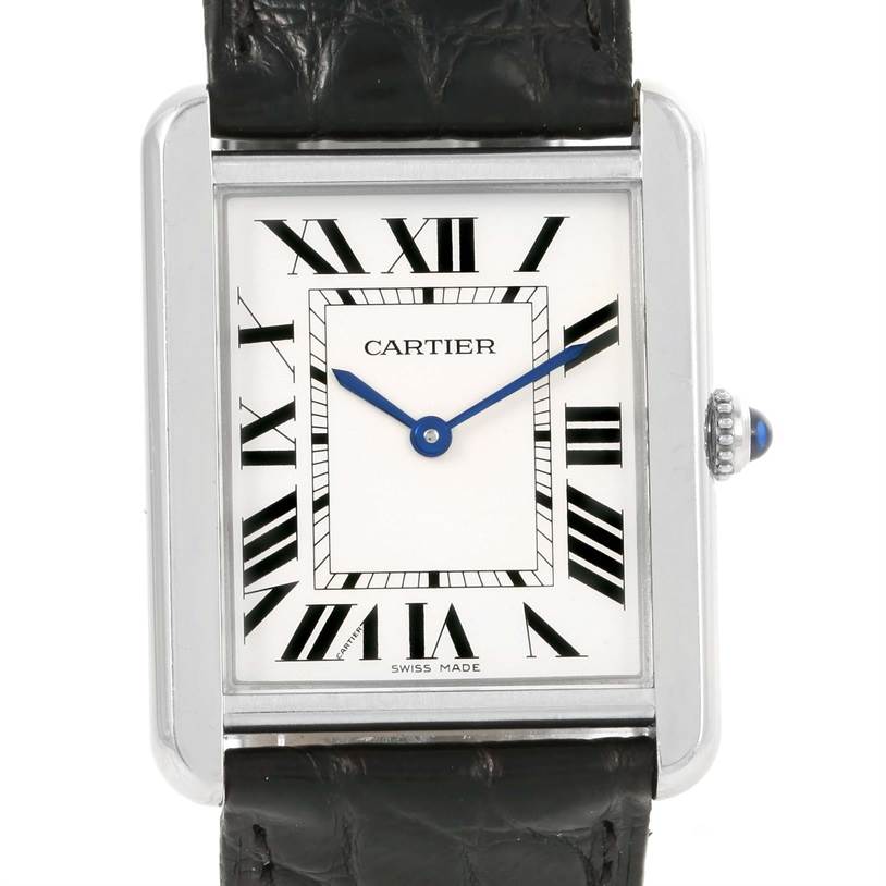 The image shows the Cartier Tank Solo W1018355 Stainless Steel Silver Dial W1018355 Stainless Steel Silver Dial watch from a front angle, displaying the face, roman numerals, blue hands, and a portion of the leather strap.