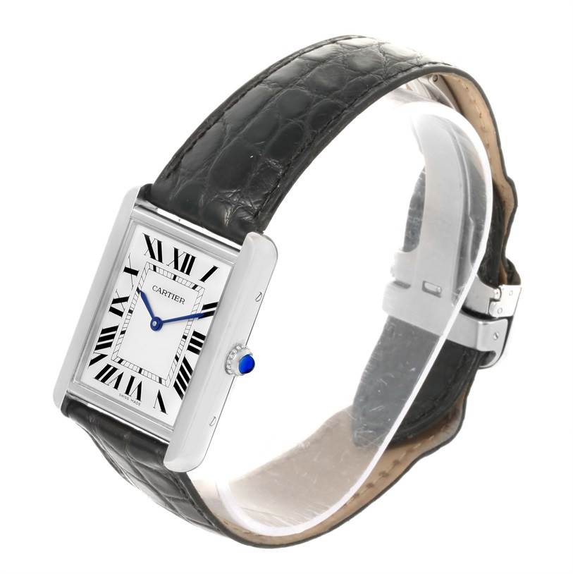 The image shows a Cartier Tank Solo W1018355 Stainless Steel Silver Dial W1018355 Stainless Steel Silver Dial watch, showcasing its rectangular face, Roman numeral dial, and leather strap from an oblique angle.