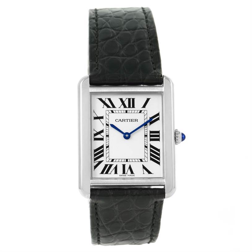 The image shows a Tank Solo model by Cartier from the front, displaying the face, Roman numerals, blue hands, and black leather strap.