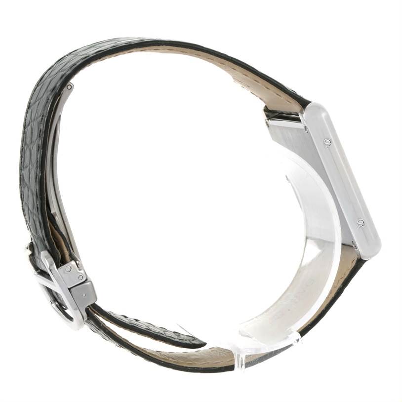 The image shows a side view of the Cartier Tank Solo W1018355 Men
s Stainless Steel Silver Dial W1018355 Men
s Stainless Steel Silver Dial watch, highlighting the strap, buckle, and side profile of the watch case.