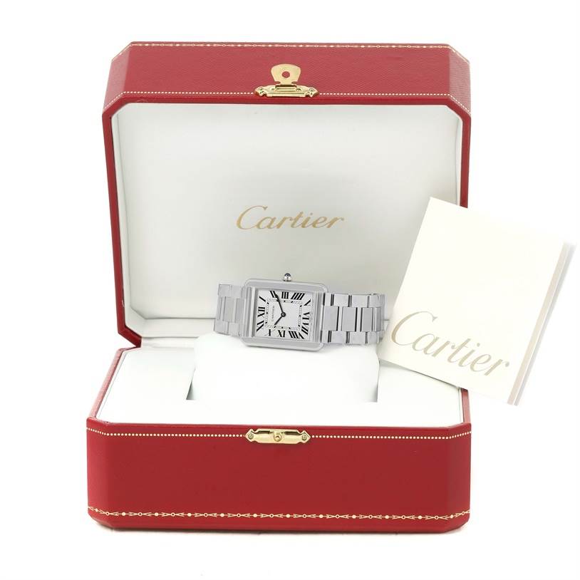 The Cartier Tank Solo W5200014 Men
s Stainless Steel Silver Dial W5200014 Men
s Stainless Steel Silver Dial watch is shown front-facing, placed inside its red presentation box, with a booklet beside it.