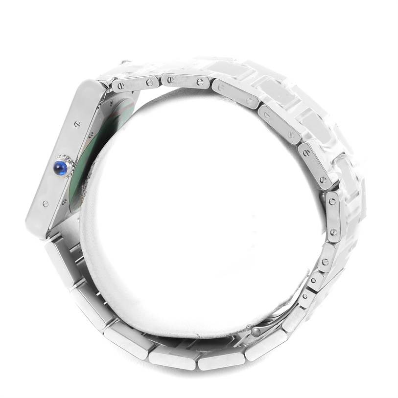 The image shows a side angle of the Cartier Tank Solo W5200028 Men
s Stainless Steel Silver Dial W5200028 Men
s Stainless Steel Silver Dial watch, focusing on the watch case, crown, and part of the bracelet.