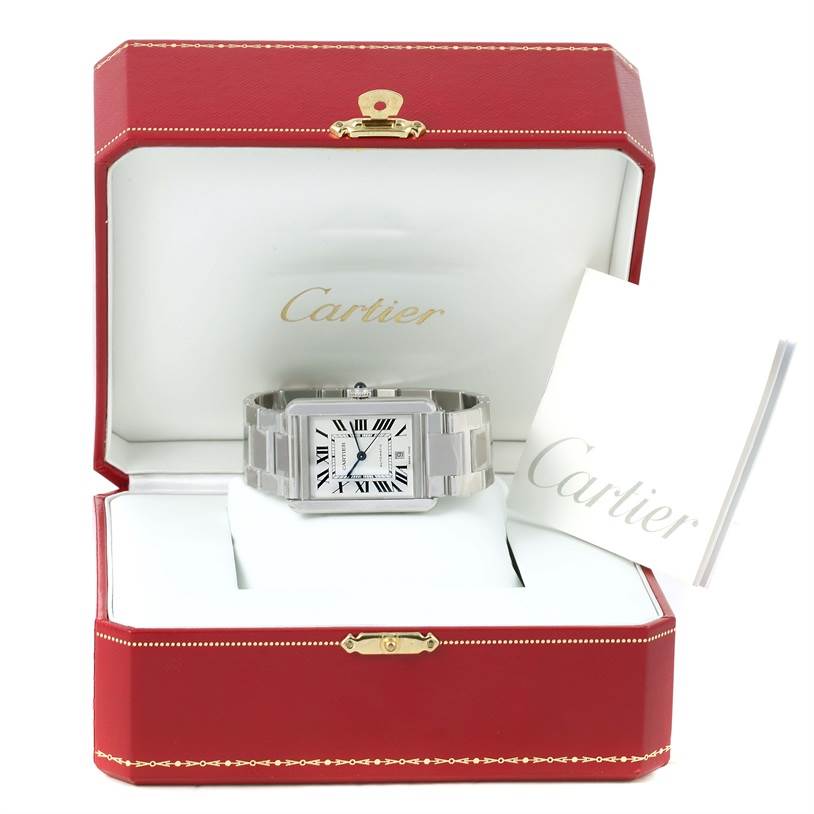 The Cartier Tank Solo W5200028 Men
s Stainless Steel Silver Dial W5200028 Men
s Stainless Steel Silver Dial watch is shown from the front inside its open red presentation box, alongside a booklet.