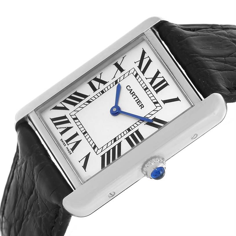 The Cartier Tank Solo W1018355 Men
s Stainless Steel Silver Dial W1018355 Men
s Stainless Steel Silver Dial watch is shown at a slight angle, displaying its face, Roman numerals, blue hands, crown, and part of the leather strap.