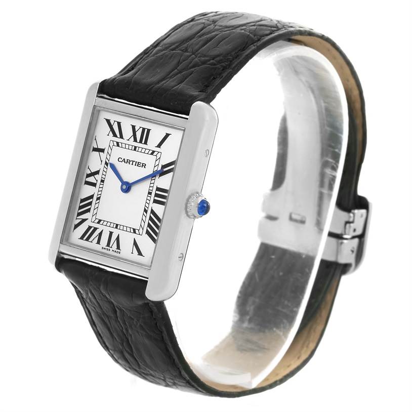 The Tank Solo by Cartier is shown at a three-quarter angle, displaying its face, crown, and leather strap.