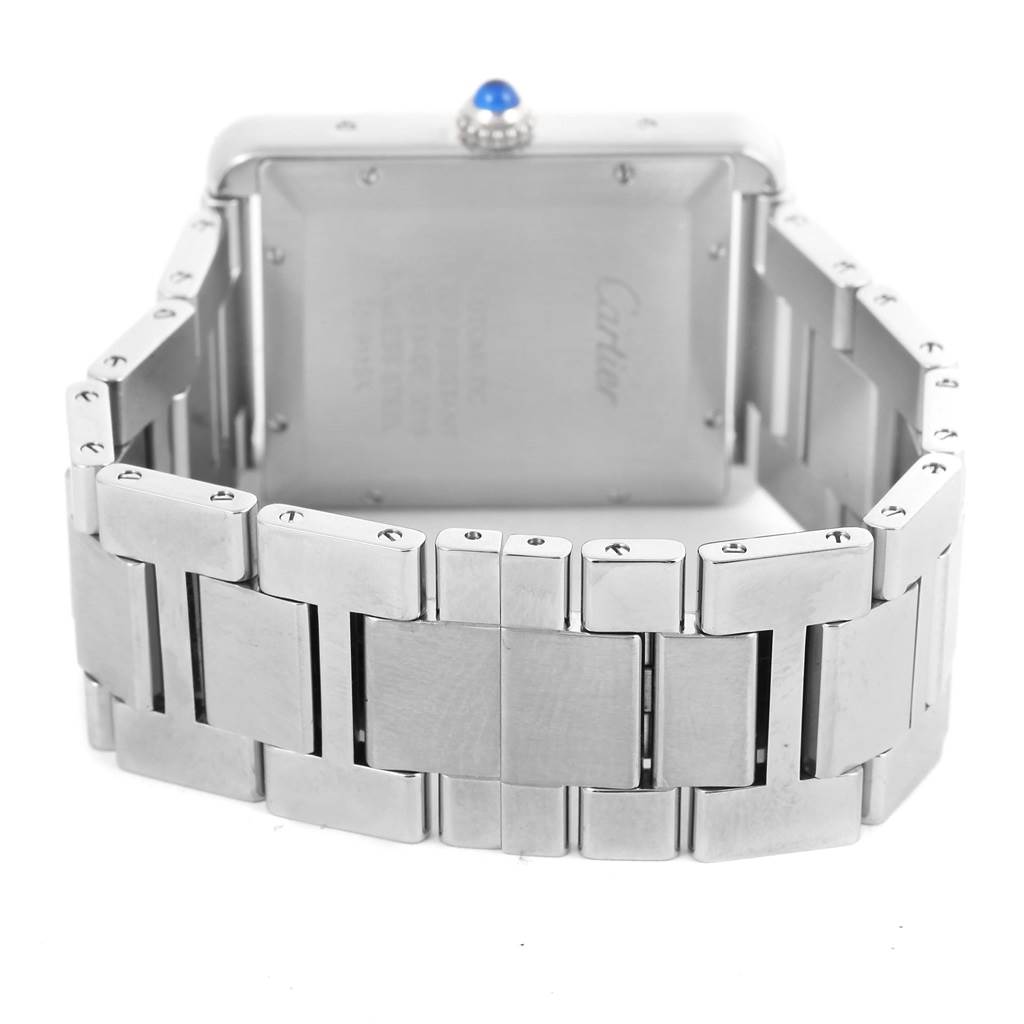 The image shows the back view of the Cartier Tank Solo W5200028 Men
s Stainless Steel Silver Dial W5200028 Men
s Stainless Steel Silver Dial watch, focusing on the case back and metal bracelet.