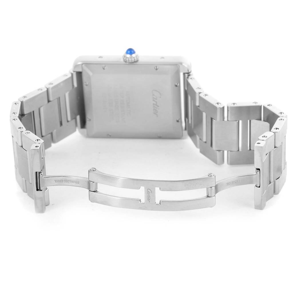 The image shows the back view of a Cartier Tank Solo W5200028 Men
s Stainless Steel Silver Dial W5200028 Men
s Stainless Steel Silver Dial watch with its stainless steel bracelet and deployment clasp opened.