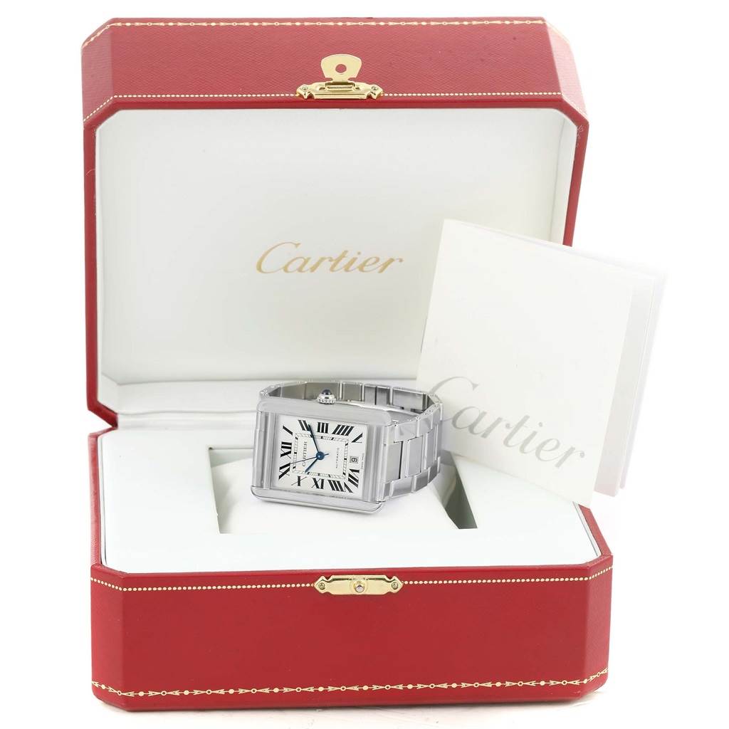 The Cartier Tank Solo W5200028 Men
s Stainless Steel Silver Dial W5200028 Men
s Stainless Steel Silver Dial watch is displayed in its open red box with instructional booklets.