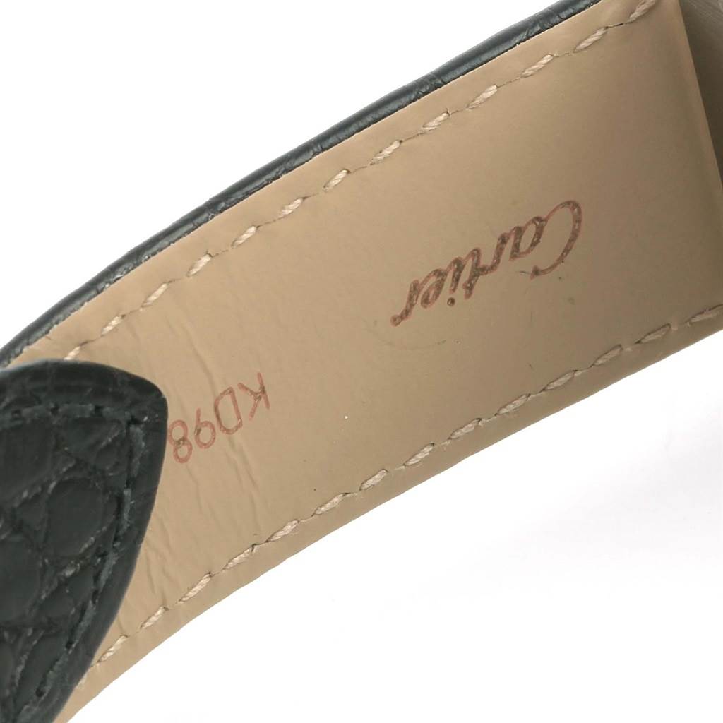 This image shows a close-up view of the underside of a Cartier Tank Solo W1018355 Stainless Steel Silver Dial W1018355 Stainless Steel Silver Dial watch strap.