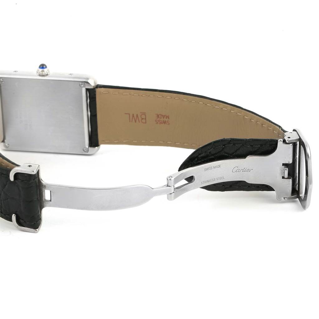 The image shows the back and clasp mechanism of a Cartier Tank Solo W1018355 Stainless Steel Silver Dial W1018355 Stainless Steel Silver Dial watch with a leather strap.