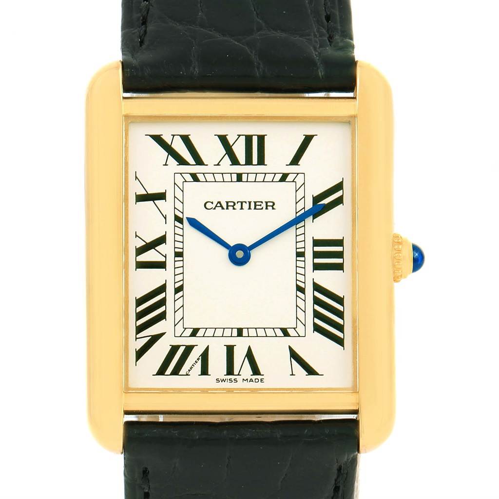 This is a front view of the Cartier Tank Solo W1018855 Men
s Steel and Gold (two tone) Silver Dial W1018855 Men
s Steel and Gold (two tone) Silver Dial watch, showing its rectangular face, Roman numerals, blue hands, and black leather strap.
