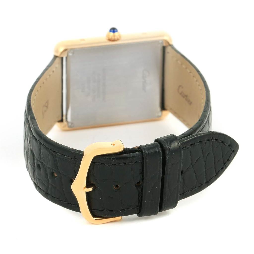 This image shows the back case, strap, and clasp of the Cartier Tank Solo W1018855 Men
s Steel and Gold (two tone) Silver Dial W1018855 Men
s Steel and Gold (two tone) Silver Dial watch, viewed from the rear angle.