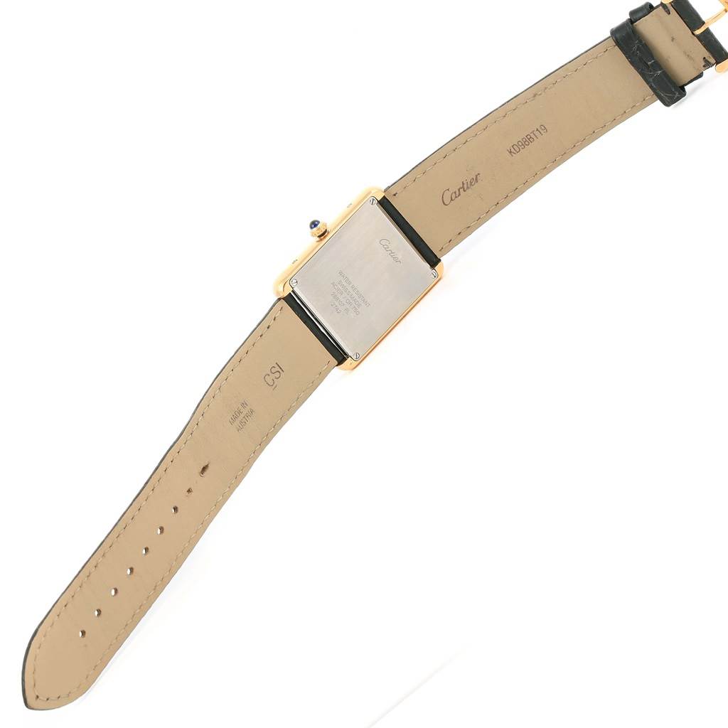 This image shows the back case and leather strap of the Cartier Tank Solo W1018855 Men
s Steel and Gold (two tone) Silver Dial W1018855 Men
s Steel and Gold (two tone) Silver Dial watch.