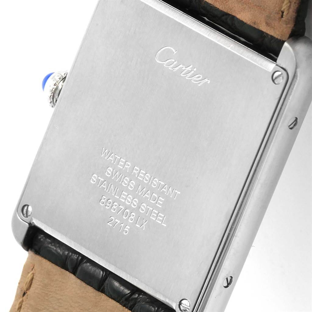 The image shows the back case of the Cartier Tank Solo W1018355 Men
s Stainless Steel Silver Dial W1018355 Men
s Stainless Steel Silver Dial watch, highlighting its water resistance and material details.