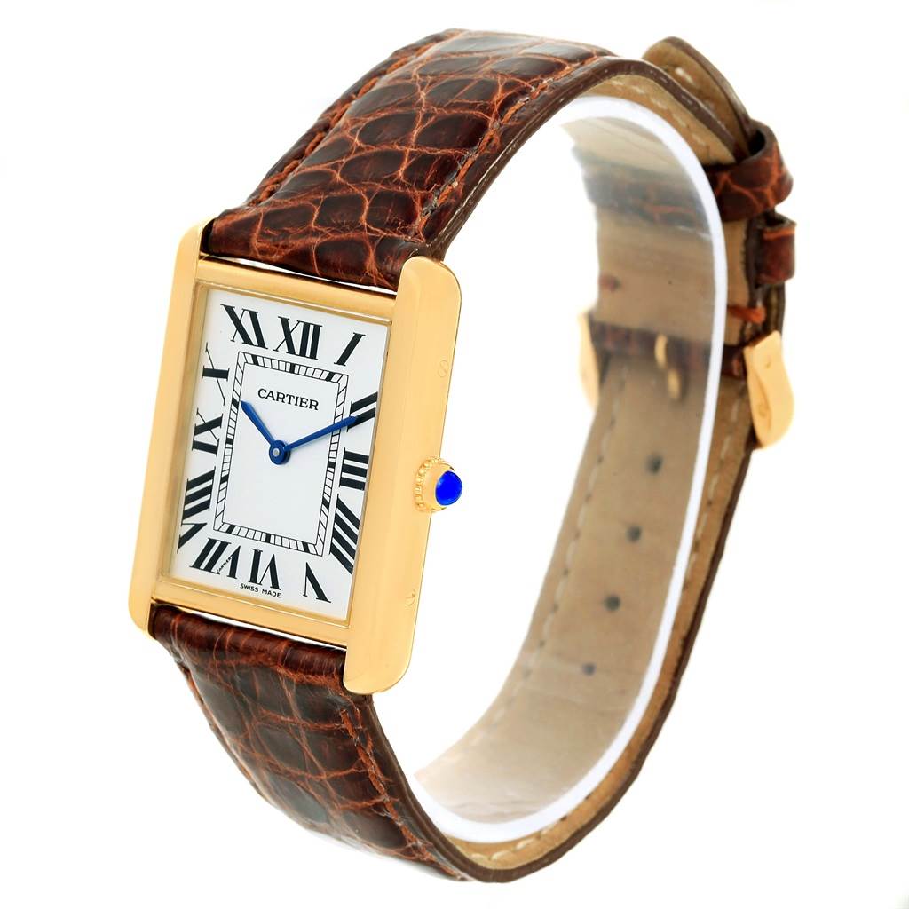 The image shows a Cartier Tank Solo W1018855 Men
s Steel and Gold (two tone) Silver Dial W1018855 Men
s Steel and Gold (two tone) Silver Dial watch at a slight angle, highlighting its rectangular face, Roman numerals, and brown leather strap.