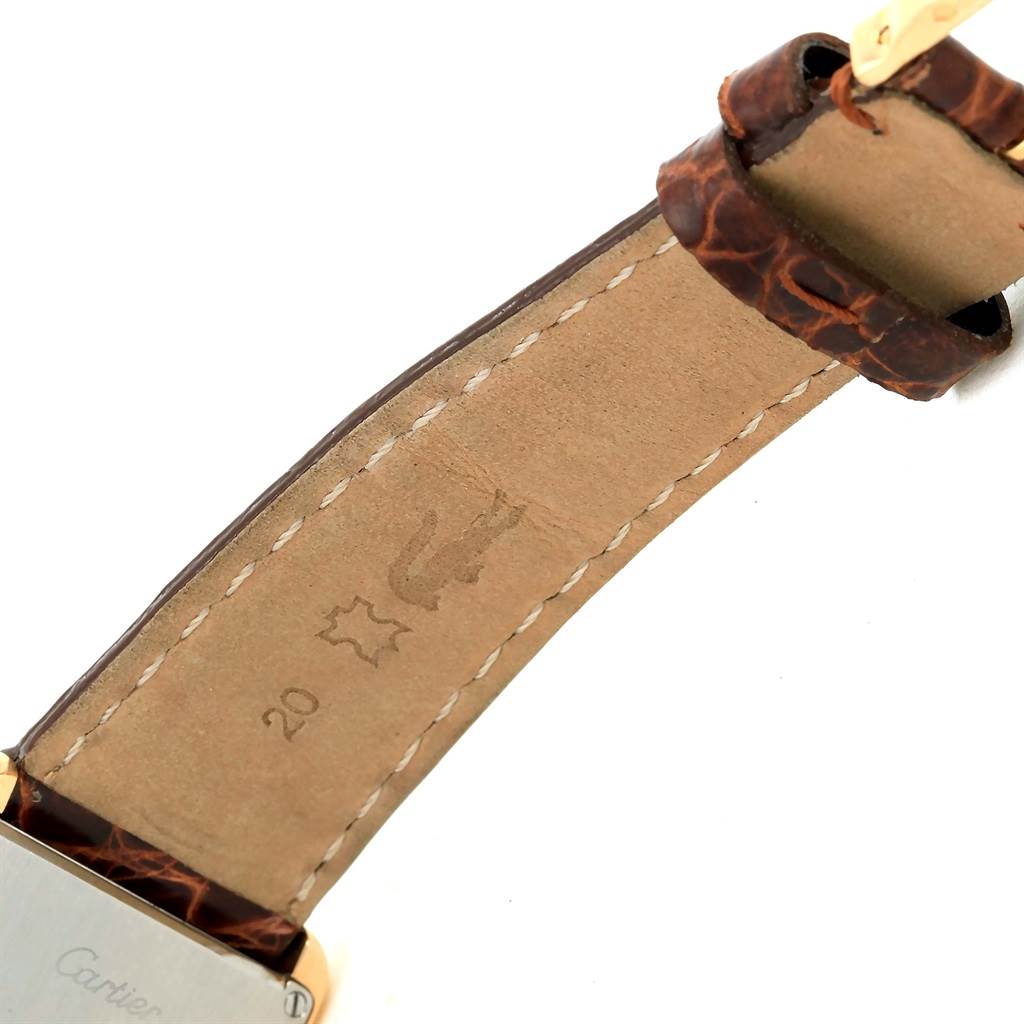 The image shows the inside leather strap and part of the back case of the Tank Solo watch by Cartier.