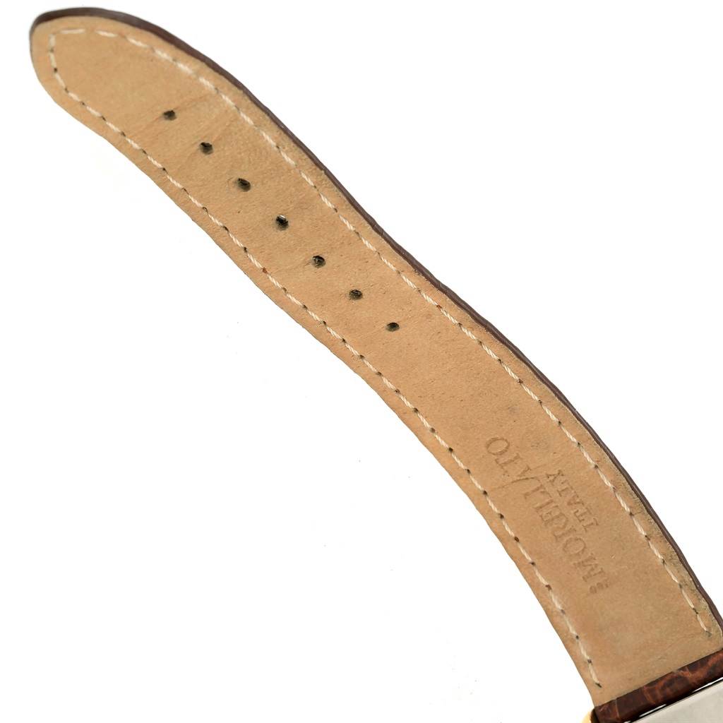 The image shows an angled view of the leather strap with holes of the Tank Solo model by Cartier.