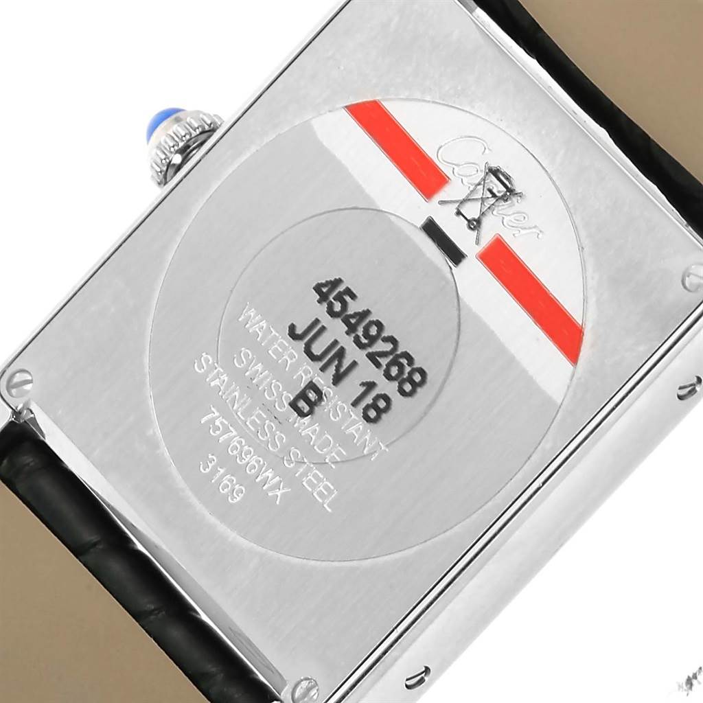 This image shows the case back of the Cartier Tank Solo W1018355 Stainless Steel Silver Dial W1018355 Stainless Steel Silver Dial watch, displaying details like serial numbers and water resistance.