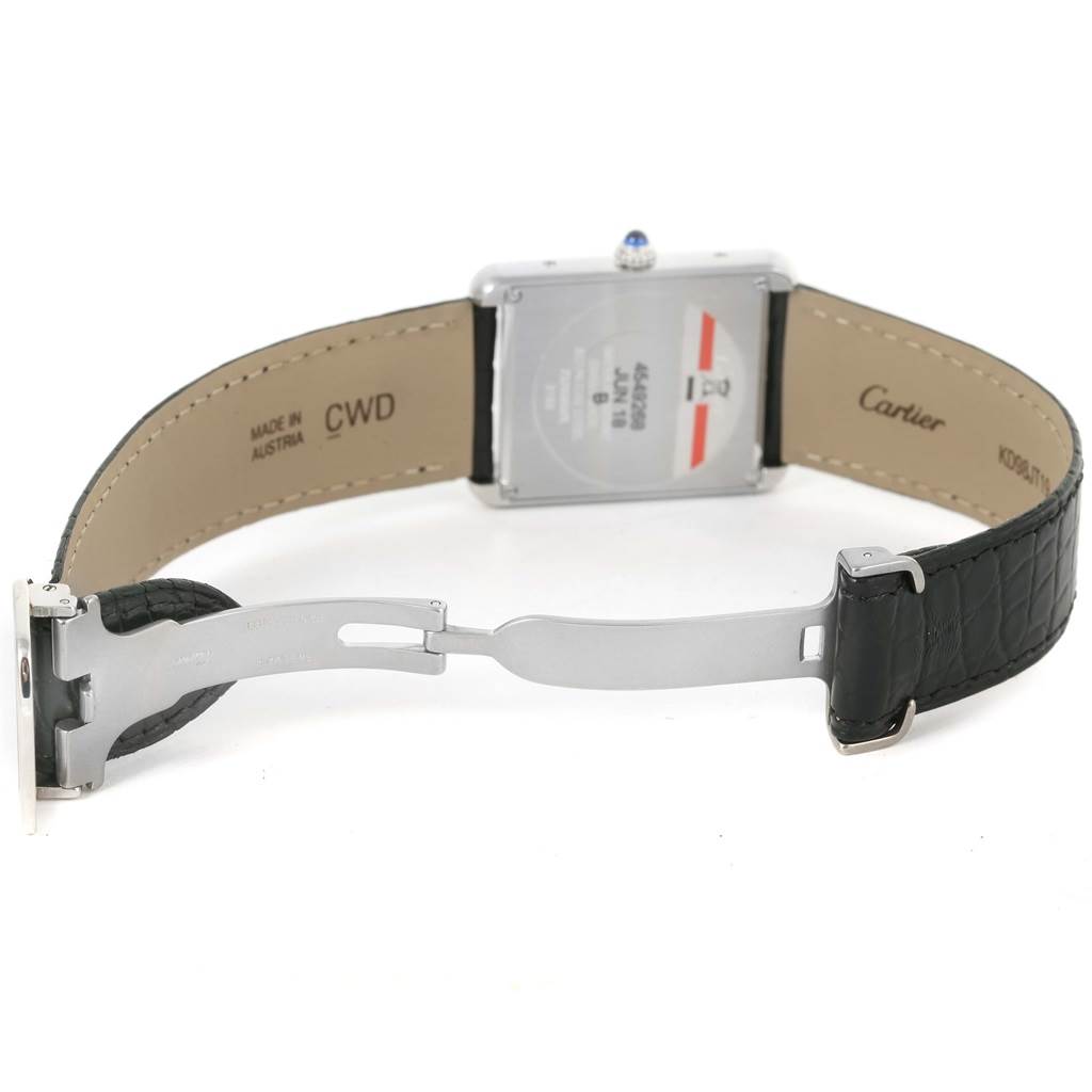 This image shows the back view of the Tank Solo model by Cartier, focusing on the leather strap and deployment clasp.