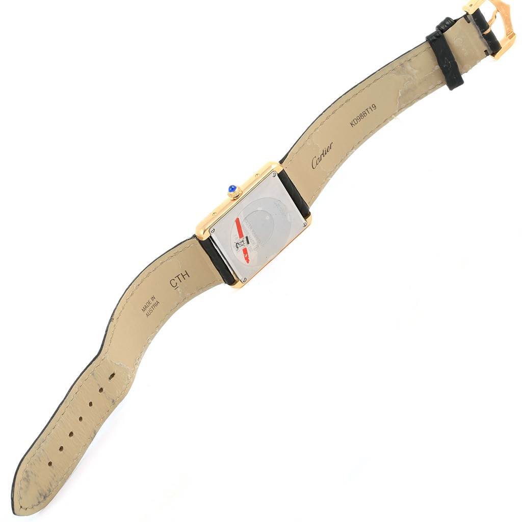 The image shows the backside and strap of a Cartier Tank Solo W1018855 Men
s Steel and Gold (two tone) Silver Dial W1018855 Men
s Steel and Gold (two tone) Silver Dial watch, angled flat with the back casing and markings visible.