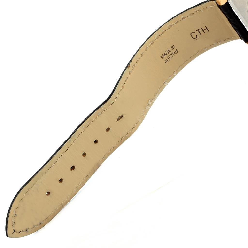 The image shows the interior part of the strap for a Cartier Tank Solo W1018855 Men
s Steel and Gold (two tone) Silver Dial W1018855 Men
s Steel and Gold (two tone) Silver Dial watch.