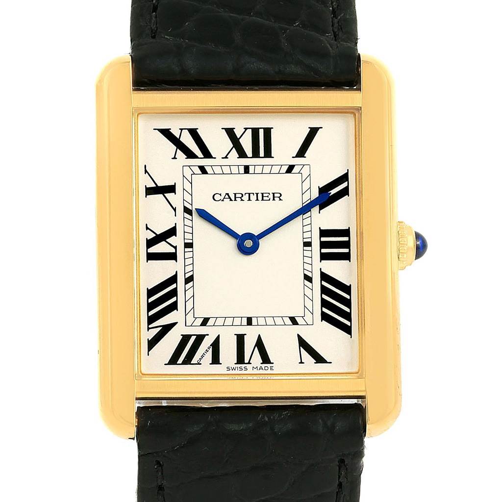 The image shows a front view of the Cartier Tank Solo W1018855 Men
s Steel and Gold (two tone) Silver Dial W1018855 Men
s Steel and Gold (two tone) Silver Dial watch, highlighting its rectangular face, Roman numerals, and black leather strap.