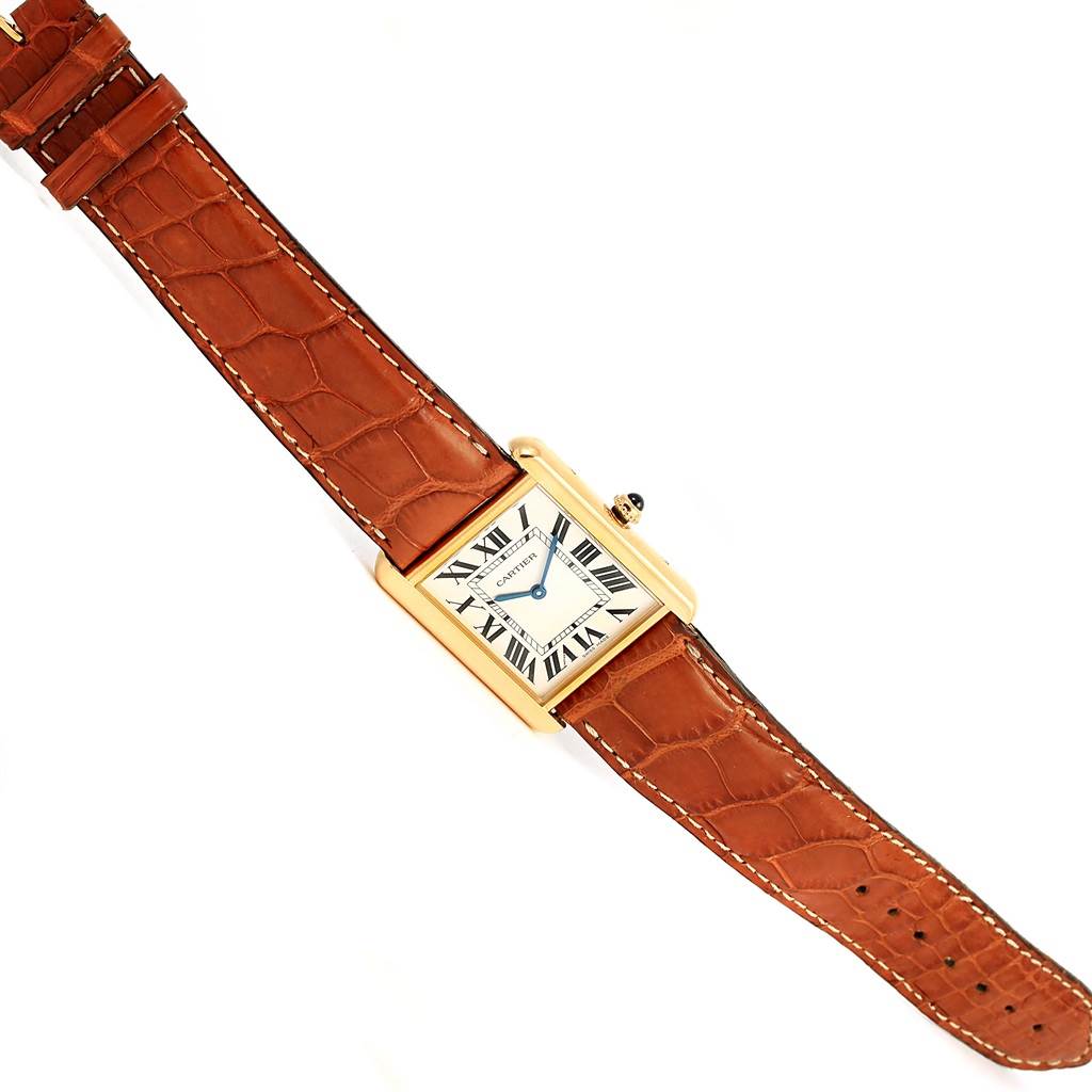 This image shows a Tank Solo model by Cartier from a top-down angle, highlighting the watch face, strap, and crown.