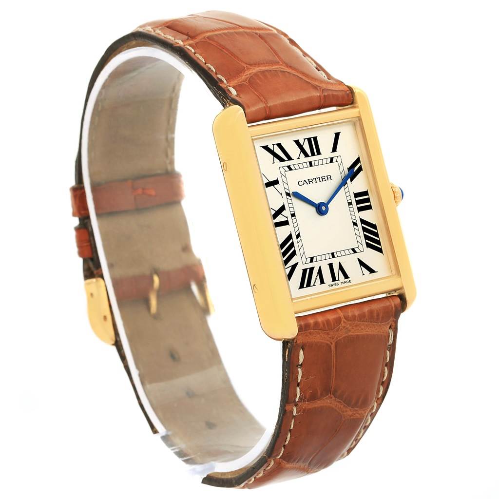 The image shows a Cartier Tank Solo W1018855 Men
s Steel and Gold (two tone) Silver Dial W1018855 Men
s Steel and Gold (two tone) Silver Dial watch at an angled view, displaying the face, leather strap, and gold casing.
