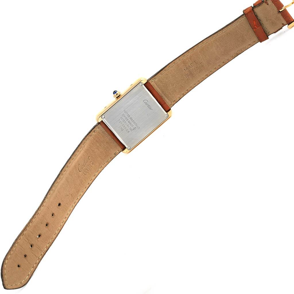 The image depicts the back view of the Cartier Tank Solo W1018855 Men
s Steel and Gold (two tone) Silver Dial W1018855 Men
s Steel and Gold (two tone) Silver Dial watch, showing its strap and case back.