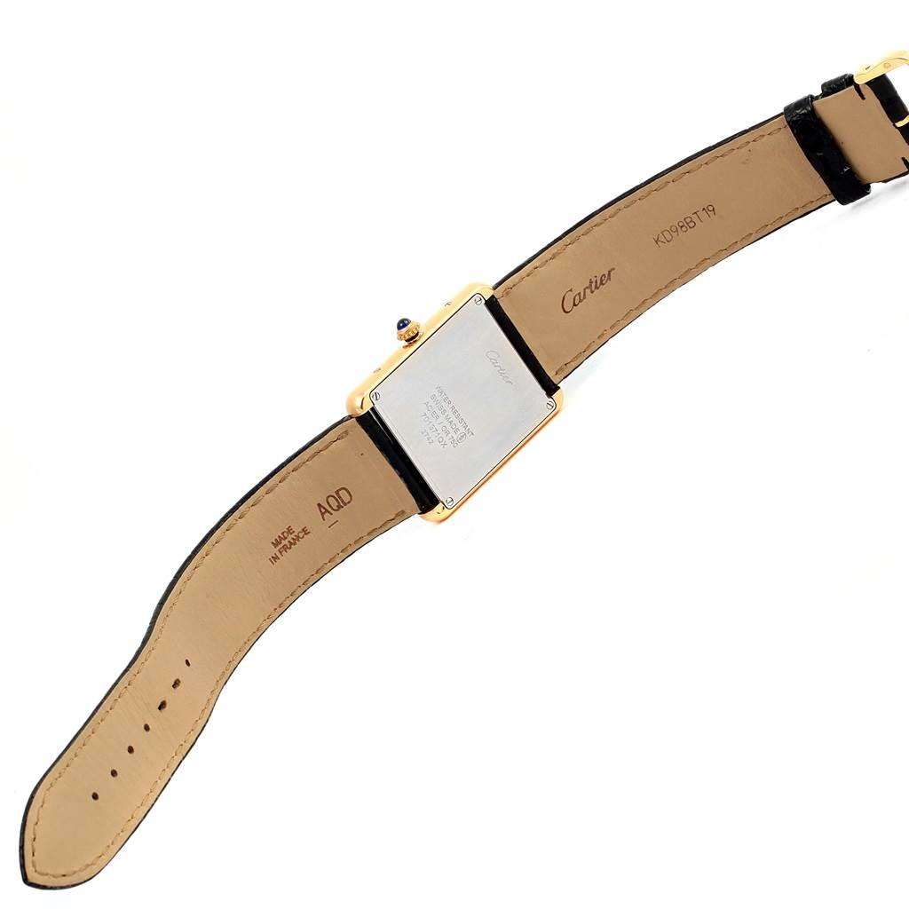 The image shows the back view of the Cartier Tank Solo W1018855 Steel and Gold (two tone) Silver Dial W1018855 Steel and Gold (two tone) Silver Dial watch, highlighting the case back and leather straps.