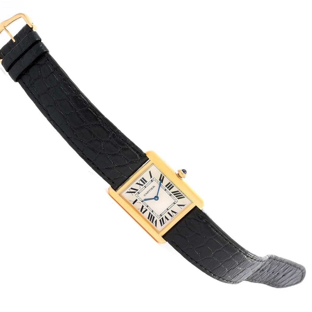 The image shows a Cartier Tank Solo W1018855 Steel and Gold (two tone) Silver Dial W1018855 Steel and Gold (two tone) Silver Dial watch at an angle displaying the entire face, case, crown, and strap.