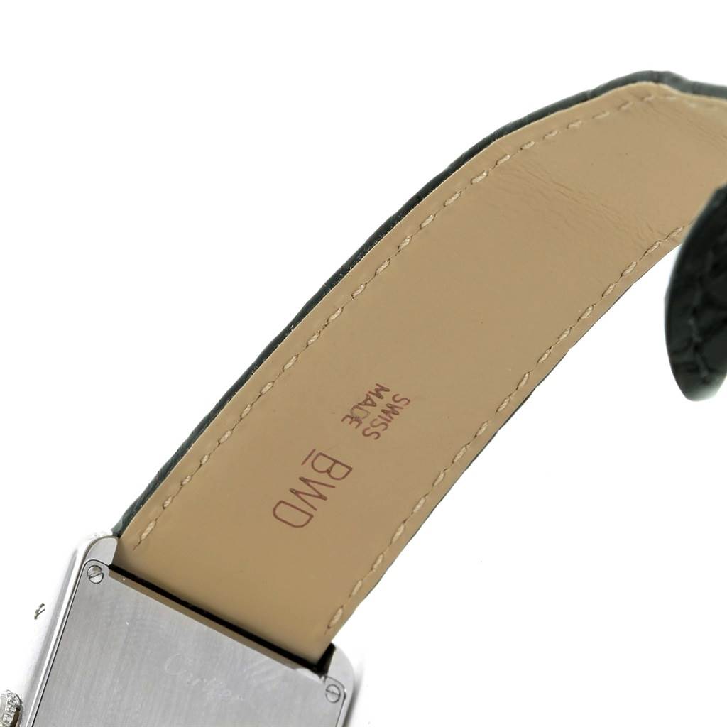 This image shows the back part of the leather strap and case of a Cartier Tank Solo W1018355 Stainless Steel Silver Dial W1018355 Stainless Steel Silver Dial watch at an angled close-up.