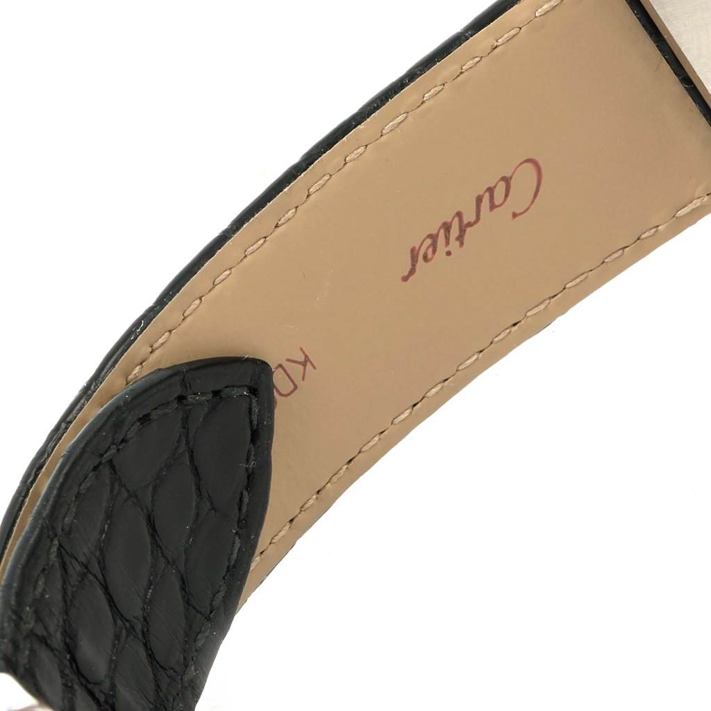 This image shows the underside of the leather strap of a Cartier Tank Solo W1018355 Stainless Steel Silver Dial W1018355 Stainless Steel Silver Dial watch, featuring the Cartier logo.