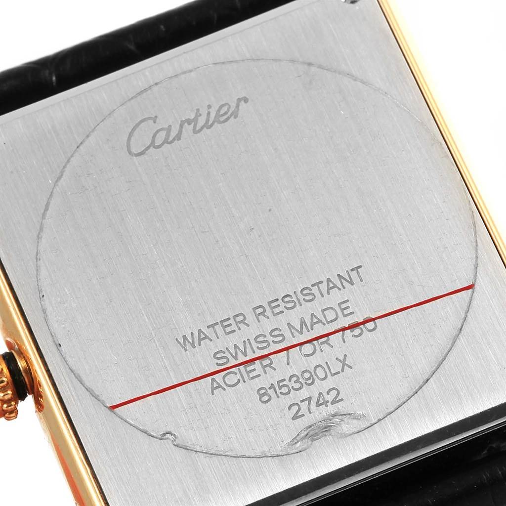 The image shows the back of a Cartier Tank Solo W1018855 Steel and Gold (two tone) Silver Dial W1018855 Steel and Gold (two tone) Silver Dial watch, highlighting its water resistance and Swiss-made details.