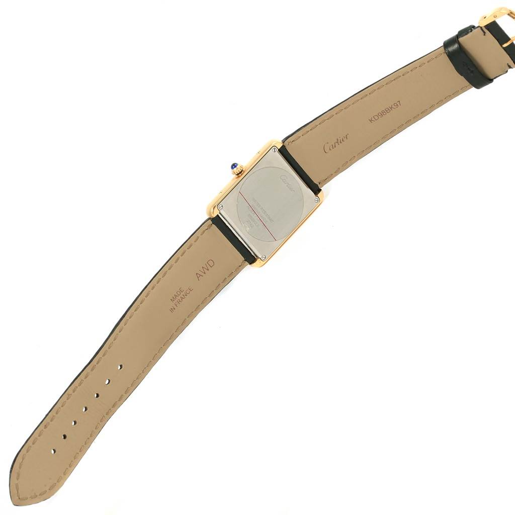 This image shows the back of the Cartier Tank Solo W1018855 Steel and Gold (two tone) Silver Dial W1018855 Steel and Gold (two tone) Silver Dial watch, highlighting the case back and the leather straps.