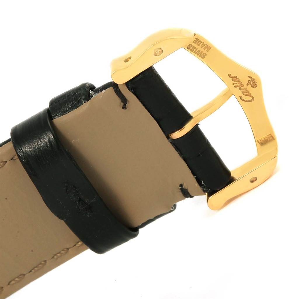 The image shows a close-up of the strap and gold buckle of a Cartier Tank Solo W1018855 Steel and Gold (two tone) Silver Dial W1018855 Steel and Gold (two tone) Silver Dial watch.