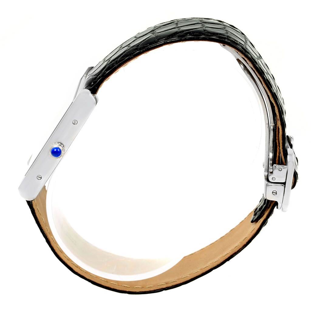 This side-angle shot showcases the leather band and side profile, including the crown, of the Cartier Tank Solo W1018355 Men
s Stainless Steel Silver Dial W1018355 Men
s Stainless Steel Silver Dial watch.