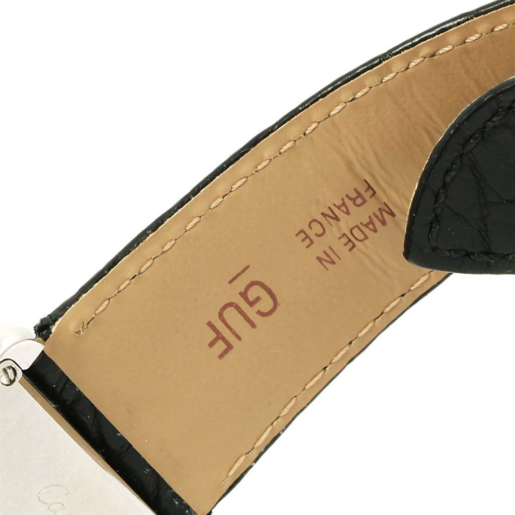 The image shows a close-up of the underside of the Cartier Tank Solo W1018355 Men
s Stainless Steel Silver Dial W1018355 Men
s Stainless Steel Silver Dial watch strap, highlighting its stitching and "Made in France" marking.