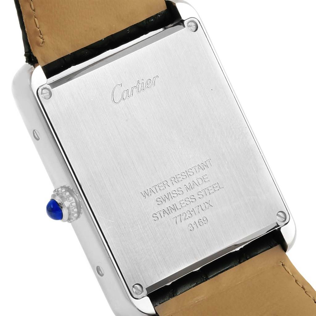 The image shows the back of the Cartier Tank Solo W1018355 Men
s Stainless Steel Silver Dial W1018355 Men
s Stainless Steel Silver Dial watch, highlighting the case back and the crown.
